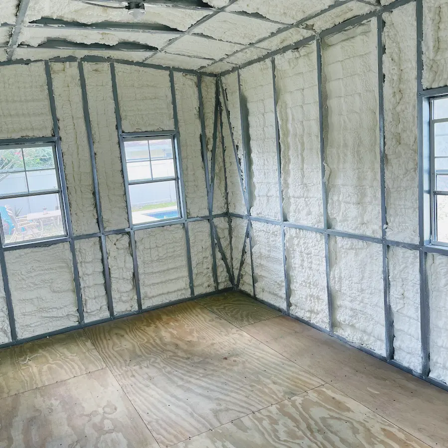 Closed-cell spray foam insulation applied to wall cavities in a residential project in Fort Mitchell